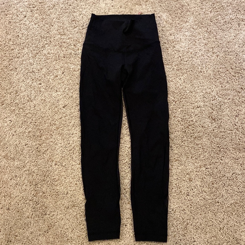 Lululemon high waist black legging. Mesh back leg. Size 4
